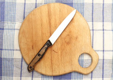 kitchen  board and knife, top view
