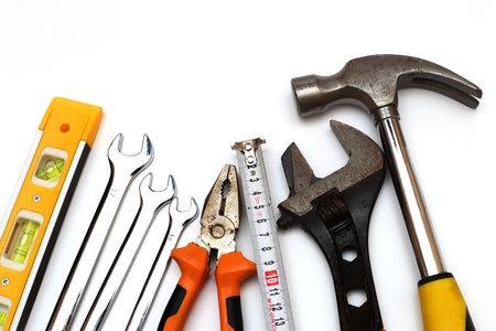 some different hand tools over whiteの写真素材