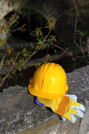 safety first yellow helmet at the work placeの写真素材