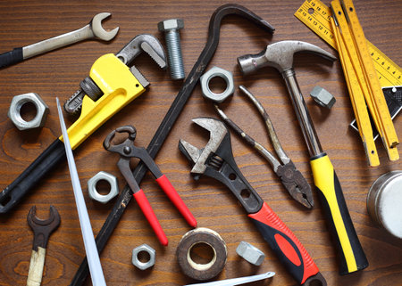 banch of different hand tools over workplace