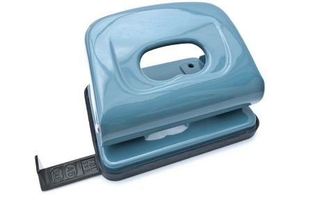 A single blue hole puncher isolated over whiteの写真素材