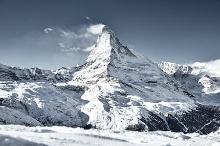 winter Matterhorn with a cloud near the summitの写真素材