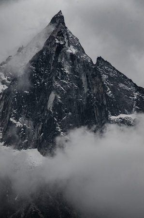 panoramic beautiful view of Ama Dablam covered by clouds from trek to Everset in  contrast view.の写真素材