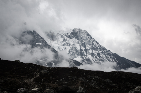 panoramic beautiful view of Ama Dablam covered by clouds from trek to Everset in  contrast view.の写真素材