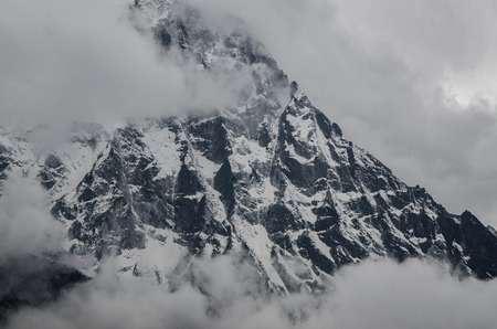 panoramic beautiful view of Ama Dablam covered by clouds from trek to Everset in  contrast view.の写真素材