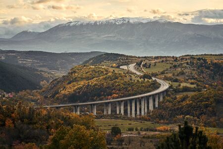 Curving alpine road in the mountains of Italy.の写真素材