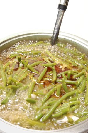 Vegetable soup with green beans,cooking on the stoveの写真素材