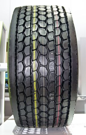 Huge truck wheel isolated on expo displayの写真素材