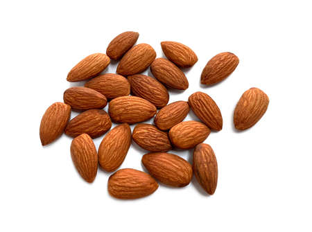 Almonds isolated on white background.Top view.の写真素材