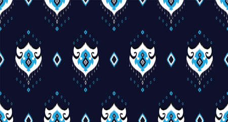 Colorful Ikat ethnic pattern vector background. seamless ikat pattern traditional, Design for background, wallpaper, Batik, fabric, carpet, clothing, wrapping, and textile.indian pattern illustration.の写真素材