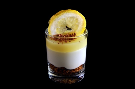 Desert of lemon bavarois isolated on blackの写真素材