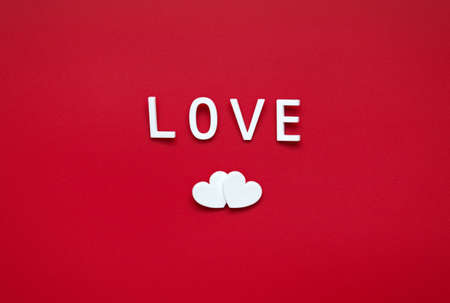 two hearts, love. white on redの写真素材
