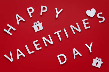 Valentine's Day! word of white letters are arranged diagonally. background red