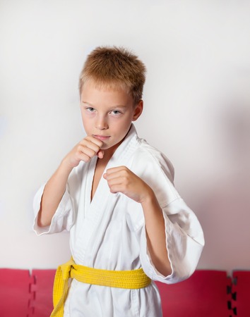 Children during training in karate. Fighting position, active lifestyleの写真素材