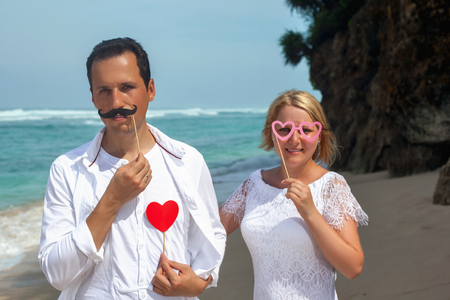 Romantic couple on the beach. On a Sunny summer dayの写真素材