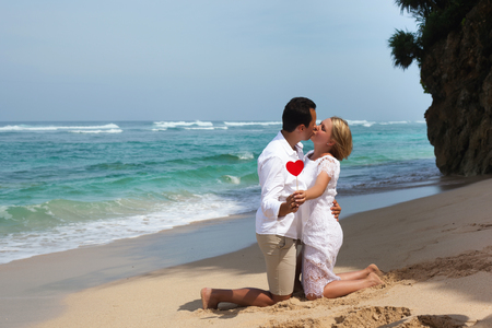 Romantic couple on the beach. On a Sunny summer dayの写真素材