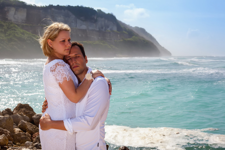 Romantic couple on the beach. On a Sunny summer dayの写真素材