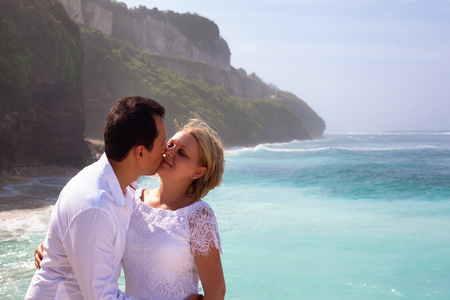 Romantic couple on the beach. On a Sunny summer dayの写真素材
