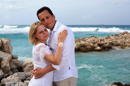 Romantic couple on the beach. On a Sunny summer dayの写真素材