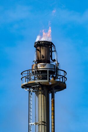 Gas burn off tower in Ohio. This is a burn off tower for an oil refineryの写真素材