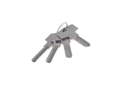 Bunch of new mosern iron keys on white background 2