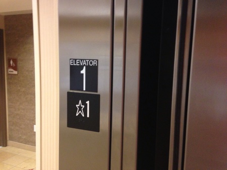 Open doors of elevator on the first floor. 