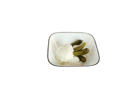 Small pickles and ice cream in a bowl isolated on a white backgroundの写真素材