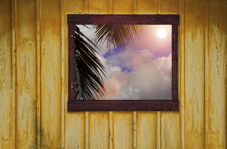 an open window with a tropical viewの写真素材