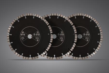 Cutting discs with diamonds - Diamond discs for concrete isolated on the gray backgroundのeditorial素材
