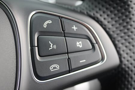 Steering wheel audio buttons