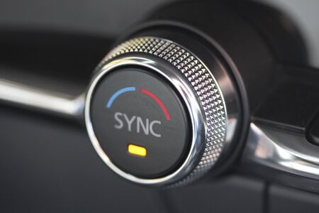 SYNC button in luxury vehicle