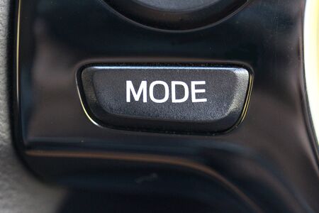 Mode button in budget vehicle