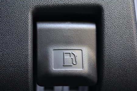 Vehicle fuel filler release tab