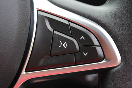 Buttons on vehicle steering wheel