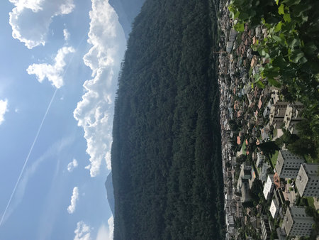 view of the city from the top of the mountain, photo as a background, digital image