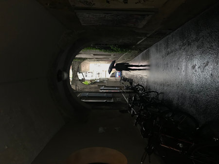Underground view of an underground tunnel with a motorbike in the backgroundの写真素材