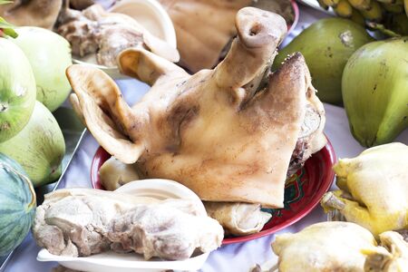 Boiled pig head for sacrifice and vow in the worship of house spirit in Asia tradition.の写真素材