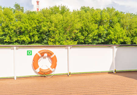 Lifebuoy on the deck of the ship water relaxing, cruise navigation upper water friends, sitting....