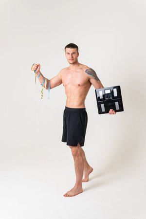 Man with weights health pondered, health and sports on a white background sore muscle, backache sick...