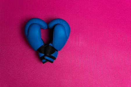 Boxing blue glove heart glovesleather mat isolated white protection punch, from competition match from shiny for winning championship, health ring.の写真素材