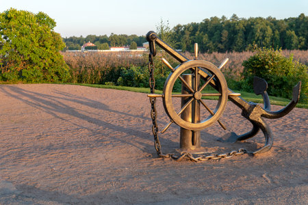 RUSSIA, PETERSBURG - AUG 19, 2022: anchor wheel water peterburg steering blue coast sand travel, for ship maritime in vacation from art port, animal berth. Marina object ancient,のeditorial素材