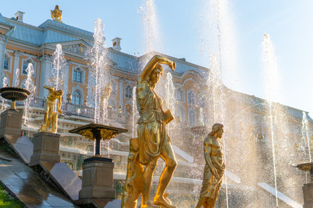 RUSSIA, PETERSBURG - AUG 19, 2022: fountain russia petersburg peterhof palace grand st landmark travel, for church blue in garden from saint sky, dome cross. Flow sight luxury,のeditorial素材