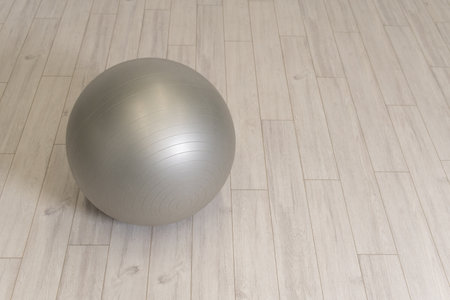 isolated grey background fitness leisure rubber ball gym body lifestyle healthy yogaの写真素材