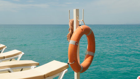 beach lifebuoy lifesaver save equipment rescue safety lifeguard vacation help sand ocean sea