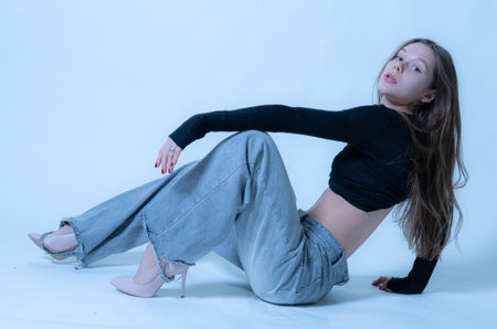 fresh model girl female natural beautiful jeans fashion romantic hair day bouquet happy smile whiteの写真素材