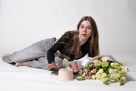 white hair female cake jeans girl model flowers happy beautiful fashion fresh smileの写真素材