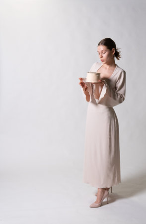 dress attractive lady young style elegant woman white cake model beauty fashion beautifulの写真素材