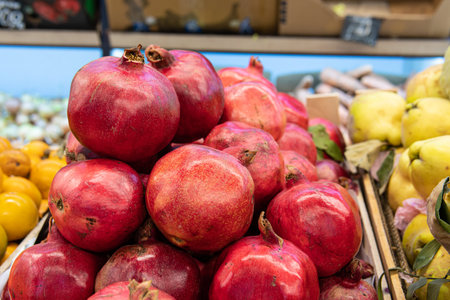 fresh nature vegetarian pomegranate food background red market natural organic healthy juicy fruitの写真素材