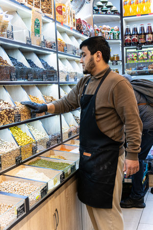 people shopping buying organic caucasian groceries man selling vegetable vegan food market sellerの写真素材