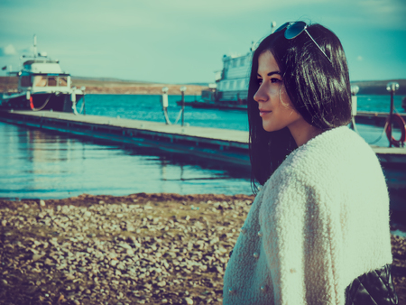 Portrait of a girl on a boat pierの写真素材